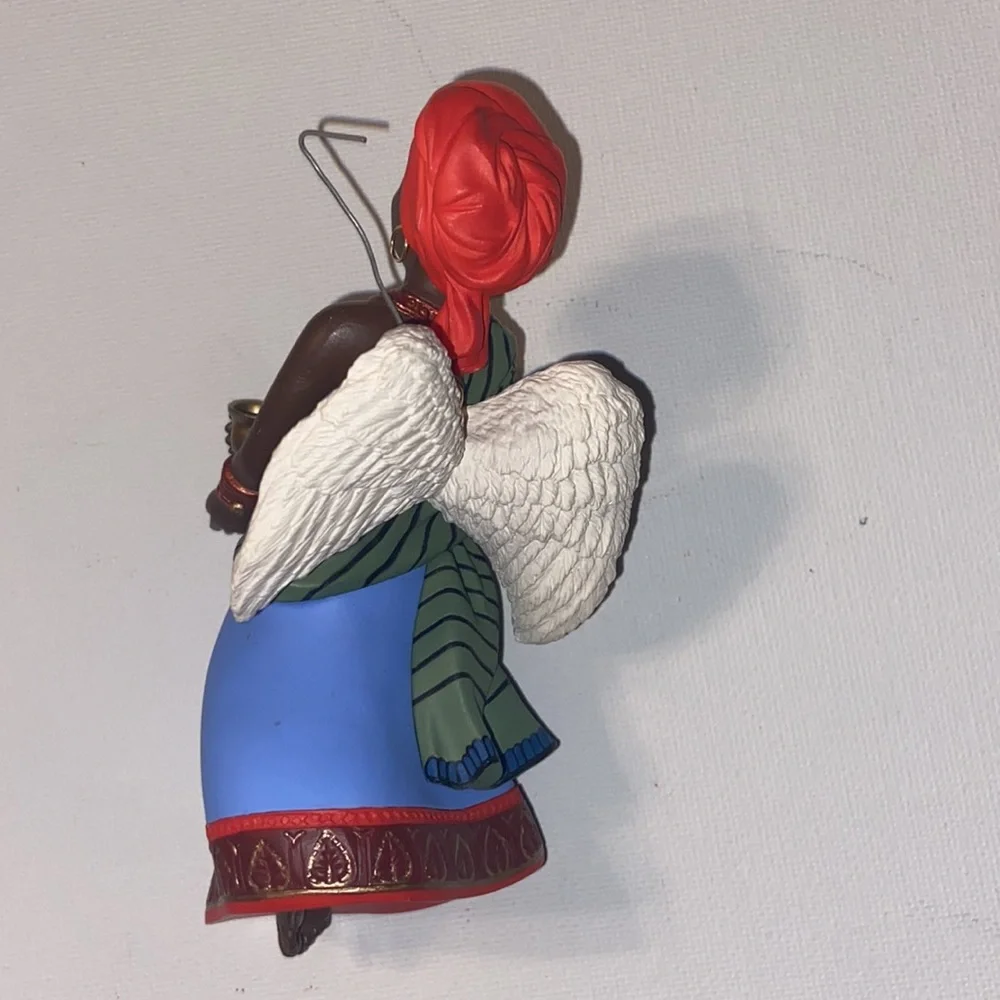 Vintage 1997 Hallmark Keepsake ornament from the A Celebration of Angels series.
